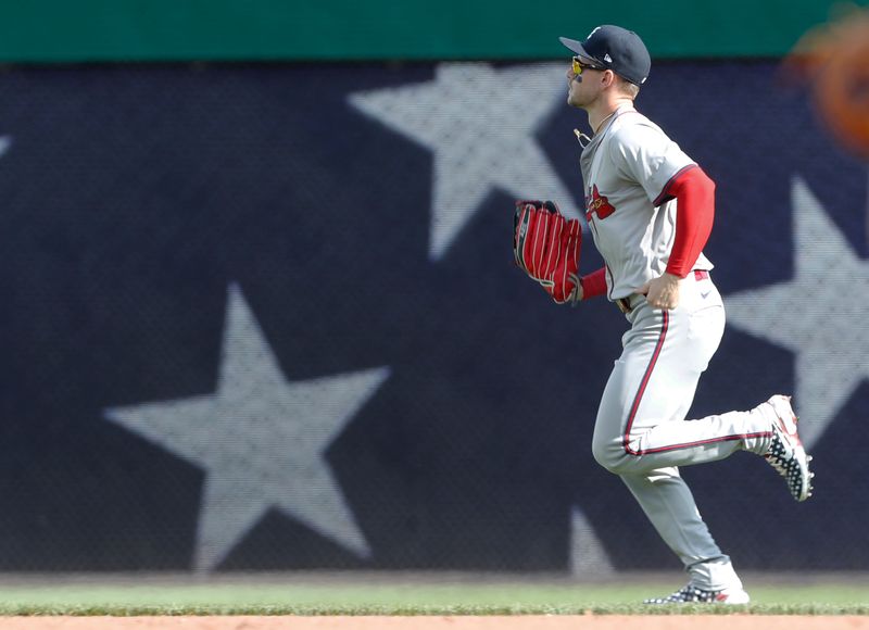 May 25, 2024; Pittsburgh, Pennsylvania, USA;  Atlanta Braves left fielder Jarred Kelenic (24) heads to his position during the third inning against the Pittsburgh Pirates at PNC Park. Mandatory Credit: Charles LeClaire-USA TODAY Sports