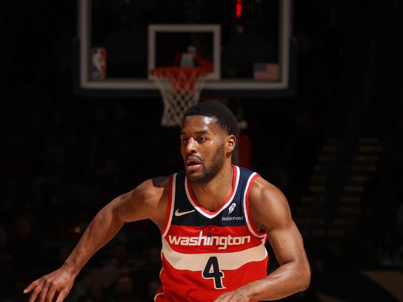 WASHINGTON, DC -? MARCH 29:  Jared Butler #4 of the Washington Wizards handles the ball during the game  on March 29, 2024 at Capital One Arena in Washington, DC. NOTE TO USER: User expressly acknowledges and agrees that, by downloading and or using this Photograph, user is consenting to the terms and conditions of the Getty Images License Agreement. Mandatory Copyright Notice: Copyright 2024 NBAE (Photo by Stephen Gosling/NBAE via Getty Images)