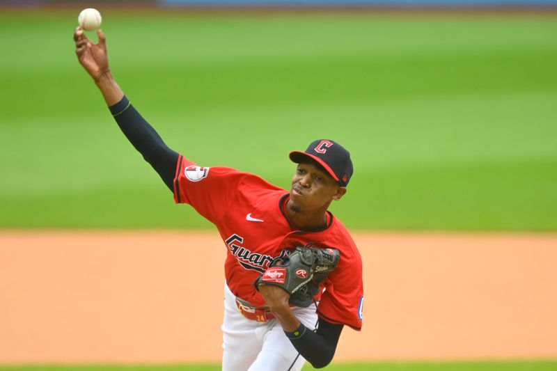 Jun 23, 2024; Cleveland, Ohio, USA; Cleveland Guardians starting pitcher Triston McKenzie (24) delivers a pitch in the first inning against the Toronto Blue Jays at Progressive Field. Mandatory Credit: David Richard-USA TODAY Sports