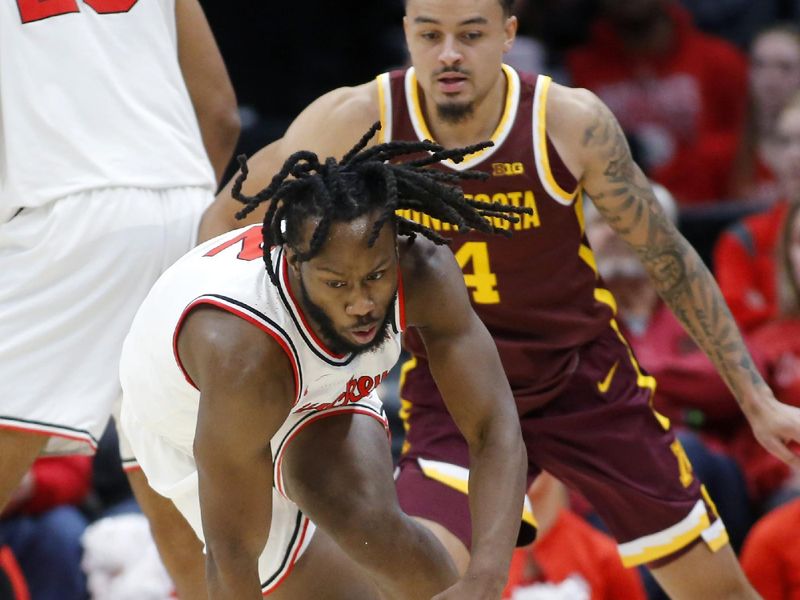 Dec 3, 2023; Columbus, Ohio, USA;  Ohio State Buckeyes guard Bruce Thornton (2) dribbles the ball as Minnesota Golden Gophers guard Braeden Carrington (4) defends during the first half at Value City Arena. Mandatory Credit: Joseph Maiorana-USA TODAY Sports