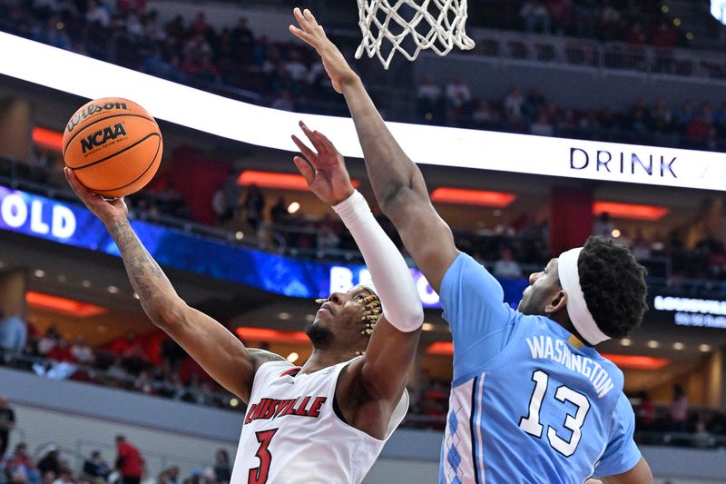 Jan 14, 2023; Louisville, Kentucky, USA;  Louisville Cardinals guard El Ellis (3) shoots against North Carolina Tar Heels forward Jalen Washington (13) during the second half at KFC Yum! Center. North Carolina defeated Louisville 80-59. Mandatory Credit: Jamie Rhodes-USA TODAY Sports