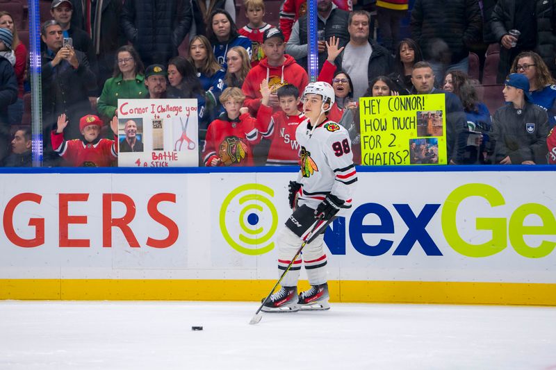 Nov 16, 2024; Vancouver, British Columbia, CAN; Chicago Blackhawks forward Connor Bedard (98) skates during warm up prior to a game against the Vancouver Canucks at Rogers Arena. Mandatory Credit: Bob Frid-Imagn Images