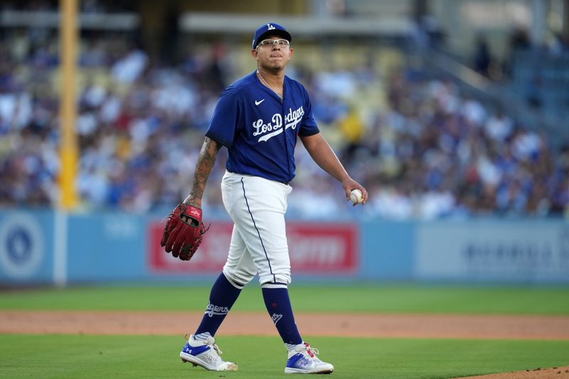 Jul 25, 2023; Los Angeles, California, USA; Los Angeles Dodgers starting pitcher Julio Urias (7) reacts in the first inning against the Toronto Blue Jays at Dodger Stadium. Mandatory Credit: Kirby Lee-USA TODAY Sports