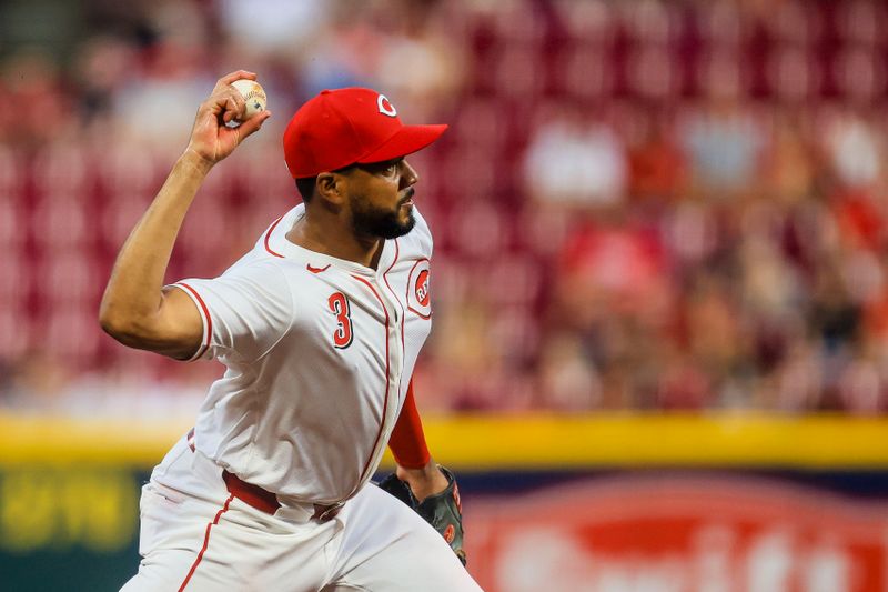 Jul 9, 2024; Cincinnati, Ohio, USA; Cincinnati Reds third baseman Jeimer Candelario (3) throws to first to get Colorado Rockies designated hitter Elias Diaz (not pictured) out in the fourth inning at Great American Ball Park. Mandatory Credit: Katie Stratman-USA TODAY Sports