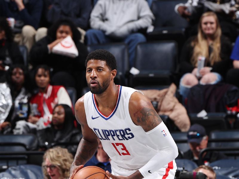 MEMPHIS, TN - FEBRUARY 23: Paul George #13 of the LA Clippers looks to pass the ball during the game against the Memphis Grizzlies on February 23, 2024 at FedExForum in Memphis, Tennessee. NOTE TO USER: User expressly acknowledges and agrees that, by downloading and or using this photograph, User is consenting to the terms and conditions of the Getty Images License Agreement. Mandatory Copyright Notice: Copyright 2024 NBAE (Photo by Joe Murphy/NBAE via Getty Images)