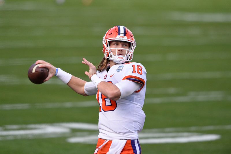 Dec 19, 2020; Charlotte, NC, USA; Clemson Tigers quarterback Trevor Lawrence (16) warms up before the game at Bank of America Stadium. Mandatory Credit: Bob Donnan-USA TODAY Sports