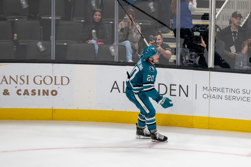 Nov 5, 2024; San Jose, California, USA;  San Jose Sharks left wing Fabian Zetterlund (20) celebrates after the goal during overtime against the Columbus Blue Jackets at SAP Center at San Jose. Mandatory Credit: Neville E. Guard-Imagn Images