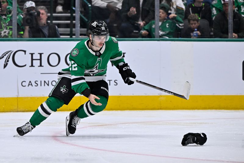 Nov 7, 2024; Dallas, Texas, USA; Dallas Stars center Mavrik Bourque (22) chases his hockey glove during the second period against the Chicago Blackhawks at the American Airlines Center. Mandatory Credit: Jerome Miron-Imagn Images