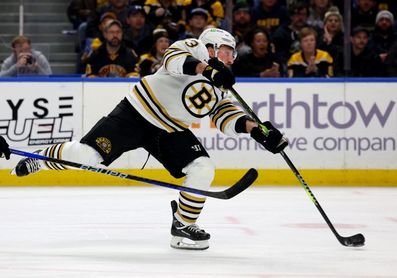 Dec 27, 2023; Buffalo, New York, USA;  Boston Bruins left wing Brad Marchand (63) takes a shot on goal during the first period against the Buffalo Sabres at KeyBank Center. Mandatory Credit: Timothy T. Ludwig-USA TODAY Sports