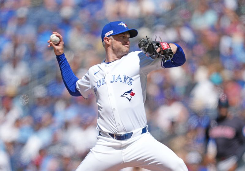 Jun 15, 2024; Toronto, Ontario, CAN; Toronto Blue Jays starting pitcher Trevor Richards (33) throws a pitch against the Cleveland Guardians during the first inning at Rogers Centre. Mandatory Credit: Nick Turchiaro-USA TODAY Sports