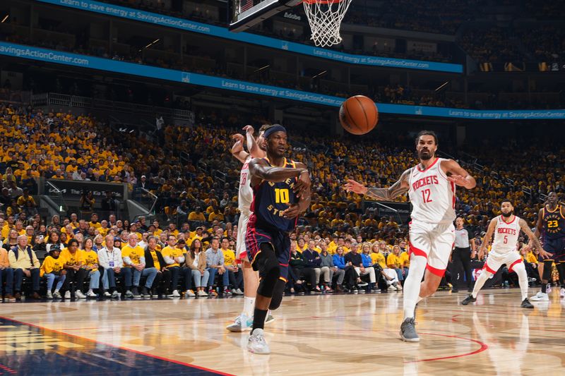 SAN FRANCISCO, CA - APRIL 28:  Jimmy Butler #10 of the Golden State Warriors passes the ball during the game against the Houston Rockets during Round 1 Game 4 of the 2025 NBA Playoffs on February 1, 2025 at Chase Center in San Francisco, California. NOTE TO USER: User expressly acknowledges and agrees that, by downloading and or using this photograph, user is consenting to the terms and conditions of Getty Images License Agreement. Mandatory Copyright Notice: Copyright 2025 NBAE (Photo by Jesse D. Garrabrant/NBAE via Getty Images)