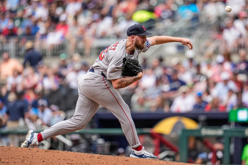 Jun 1, 2025; Cumberland, Georgia, USA; Boston Red Sox starting pitcher Garrett Crochet (35) pitches against the Atlanta Braves during the seventh inning at Truist Park. Mandatory Credit: Dale Zanine-Imagn Images