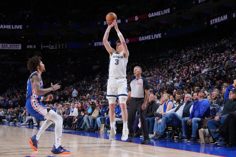 PHILADELPHIA, PA - MARCH 6: Jake LaRavia #3 of the Memphis Grizzlies shoots the ball during the game against the Philadelphia 76ers on March 6, 2024 at the Wells Fargo Center in Philadelphia, Pennsylvania NOTE TO USER: User expressly acknowledges and agrees that, by downloading and/or using this Photograph, user is consenting to the terms and conditions of the Getty Images License Agreement. Mandatory Copyright Notice: Copyright 2024 NBAE (Photo by Jesse D. Garrabrant/NBAE via Getty Images)