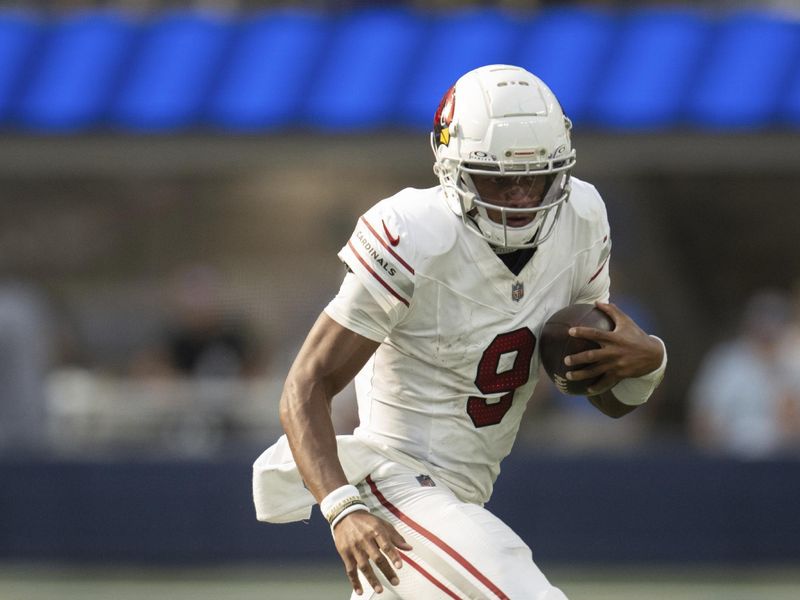Arizona Cardinals quarterback Joshua Dobbs (9) runs with the ball during an NFL football game against the Los Angeles Rams, Sunday, Oct. 15, 2023, in Inglewood, Calif. (AP Photo/Kyusung Gong)