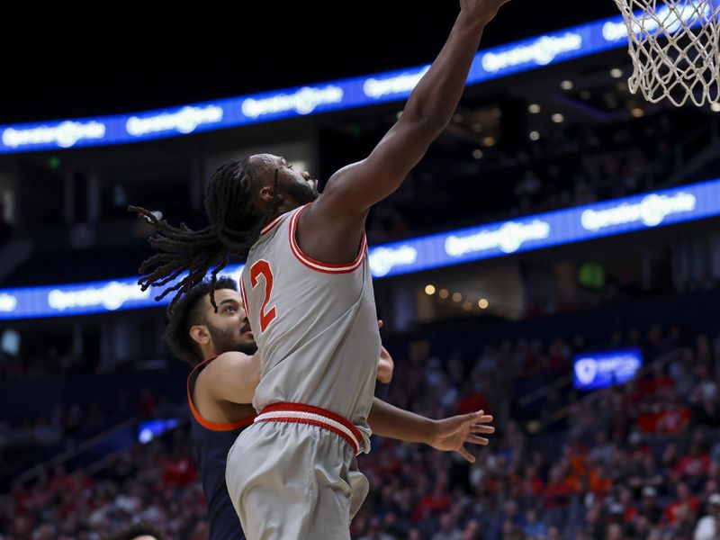 Feb 14, 2026; Nashville, Tennessee, USA;  Ohio State Buckeyes guard Bruce Thornton (2) drives to the basket past Virginia Cavaliers guard Jacari White (6) during the first half at Bridgestone Arena. Mandatory Credit: Steve Roberts-Imagn Images