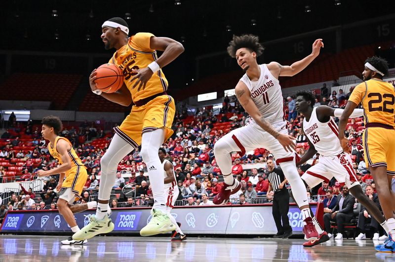 Jan 28, 2023; Pullman, Washington, USA; Arizona State Sun Devils guard Devan Cambridge (35) rebounds the ball against Washington State Cougars forward DJ Rodman (11) in the second half at Friel Court at Beasley Coliseum. Washington State won 75-58. Mandatory Credit: James Snook-USA TODAY Sports