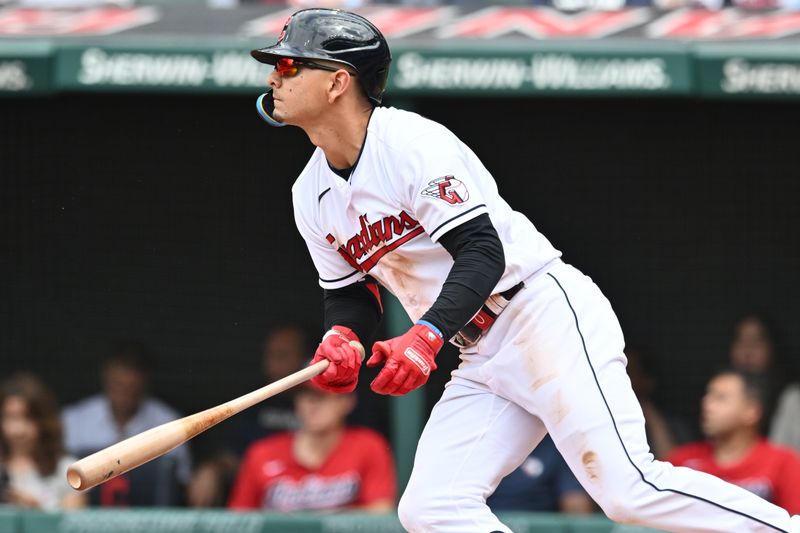 Jun 25, 2023; Cleveland, Ohio, USA; Cleveland Guardians second baseman Andres Gimenez (0) hits an RBI triple during the sixth inning against the Milwaukee Brewers at Progressive Field. Mandatory Credit: Ken Blaze-USA TODAY Sports