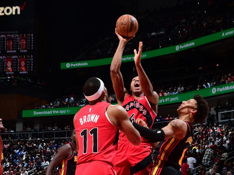 ATLANTA, GA - February 23: Scottie Barnes #4 of the Toronto Raptors drives to the basket during the game against the Atlanta Hawks on February 23, 2024 at State Farm Arena in Atlanta, Georgia.  NOTE TO USER: User expressly acknowledges and agrees that, by downloading and/or using this Photograph, user is consenting to the terms and conditions of the Getty Images License Agreement. Mandatory Copyright Notice: Copyright 2024 NBAE (Photo by Scott Cunningham/NBAE via Getty Images)