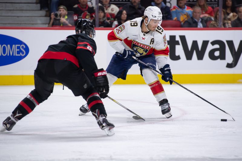 Apr 4, 2024; Ottawa, Ontario, CAN; Florida Panthers left wing Matthew Tkachuk (19) controls the puck as he skates in front of Ottawa Senators defenseman Artem Zub (2) in the second period at the Canadian Tire Centre. Mandatory Credit: Marc DesRosiers-USA TODAY Sports