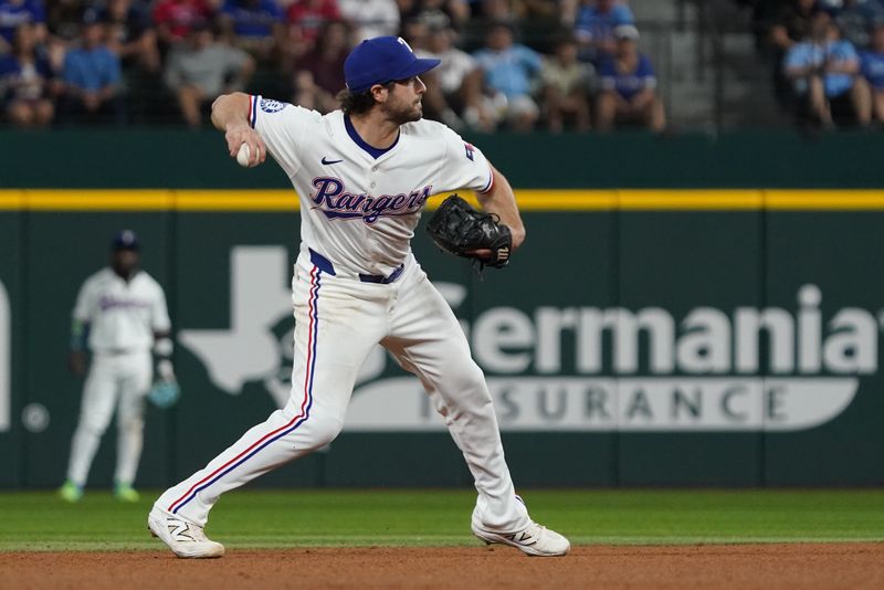 May 15, 2025; Arlington, Texas, USA; Texas Rangers shortstop Josh Smith (8) throws to firs base during the eighth inning against the Houston Astros at Globe Life Field. Mandatory Credit: Raymond Carlin III-Imagn Images