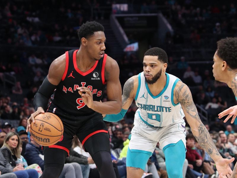 CHARLOTTE, NC - FEBRUARY 7:  RJ Barrett #9 of the Toronto Raptors handles the ball during the game against the Charlotte Hornets on February 7, 2024 at Spectrum Center in Charlotte, North Carolina. NOTE TO USER: User expressly acknowledges and agrees that, by downloading and or using this photograph, User is consenting to the terms and conditions of the Getty Images License Agreement.  Mandatory Copyright Notice:  Copyright 2024 NBAE (Photo by Brock Williams-Smith/NBAE via Getty Images)