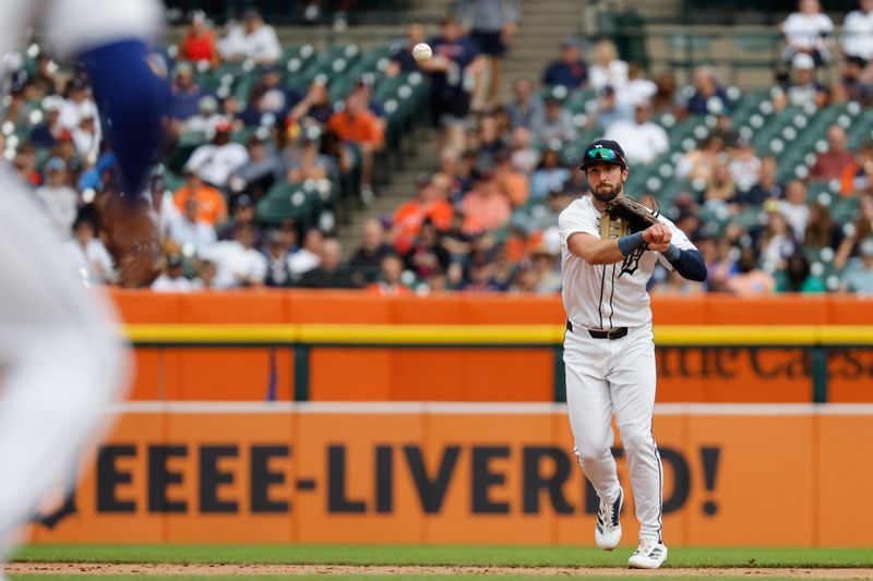 Sep 26, 2024; Detroit, Michigan, USA;  Detroit Tigers center fielder Matt Vierling (8) makes a throw to first in the sixth inning against the Tampa Bay Rays at Comerica Park. Mandatory Credit: Rick Osentoski-Imagn Images