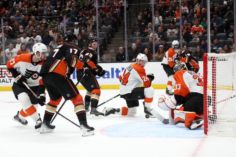 Nov 10, 2023; Anaheim, California, USA; Philadelphia Flyers goaltender Samuel Ersson (33) defends the goal during the second period against the Anaheim Ducks at Honda Center. Mandatory Credit: Kiyoshi Mio-USA TODAY Sports