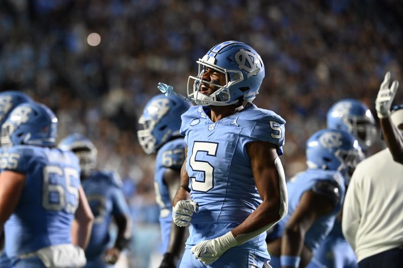 Nov 11, 2023; Chapel Hill, North Carolina, USA; North Carolina Tar Heels wide receiver J.J. Jones (5) reacts in the fourth quarter at Kenan Memorial Stadium. Mandatory Credit: Bob Donnan-USA TODAY Sports