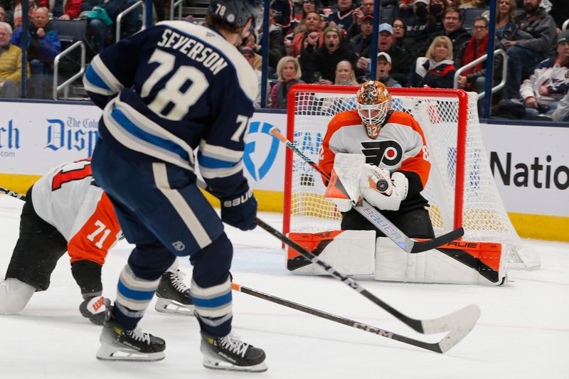 Jan 14, 2025; Columbus, Ohio, USA; Philadelphia Flyers goalie Ivan Fedotov (82) makes a save against the Columbus Blue Jackets during the third period at Nationwide Arena. Mandatory Credit: Russell LaBounty-Imagn Images