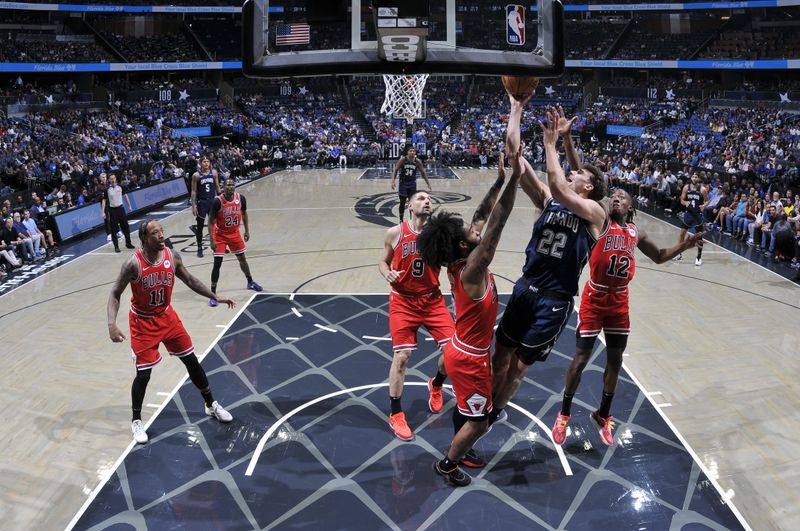 ORLANDO, FL - APRIL 7: Franz Wagner #22 of the Orlando Magic drives to the basket during the game against the Chicago Bulls on April 7, 2024 at the Kia Center in Orlando, Florida. NOTE TO USER: User expressly acknowledges and agrees that, by downloading and or using this photograph, User is consenting to the terms and conditions of the Getty Images License Agreement. Mandatory Copyright Notice: Copyright 2024 NBAE (Photo by Fernando Medina/NBAE via Getty Images)