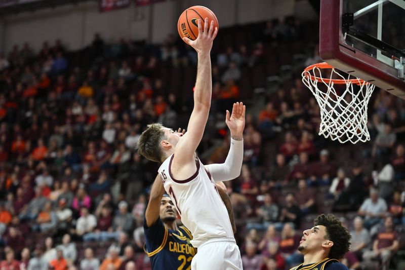 Jan 10, 2026; Blacksburg, Virginia, USA;  Virginia Tech Hokies guard Neoklis Avdalas (17) lays the ball up during the first half at Cassell Coliseum. Mandatory Credit: Brian Bishop-Imagn Images