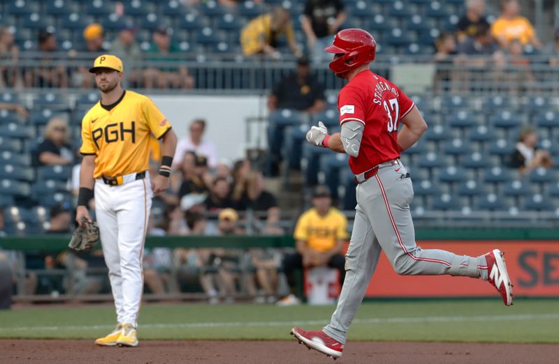 Aug 23, 2024; Pittsburgh, Pennsylvania, USA;  Cincinnati Reds catcher Tyler Stephenson (37) circlets base on a  solo home run against the Pittsburgh Pirates during the first inning at PNC Park. Mandatory Credit: Charles LeClaire-USA TODAY Sports