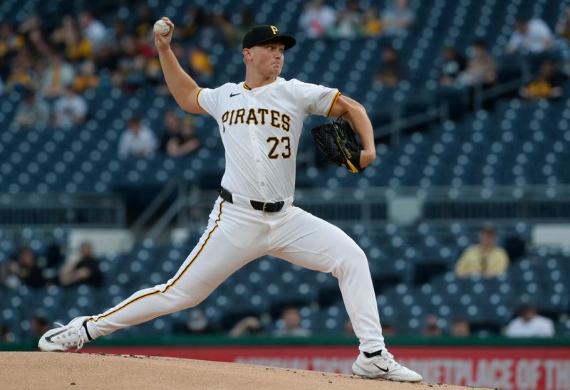 Apr 8, 2024; Pittsburgh, Pennsylvania, USA;  Pittsburgh Pirates starting pitcher Mitch Keller (23) delivers a pitch against the Detroit Tigers during the first inning at PNC Park. Mandatory Credit: Charles LeClaire-USA TODAY Sports