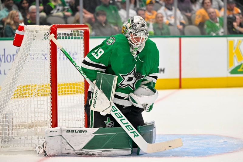 Oct 15, 2022; Dallas, Texas, USA; Dallas Stars goaltender Jake Oettinger (29) makes a save on a Nashville Predators shot during the first period at the American Airlines Center. Mandatory Credit: Jerome Miron-USA TODAY Sports