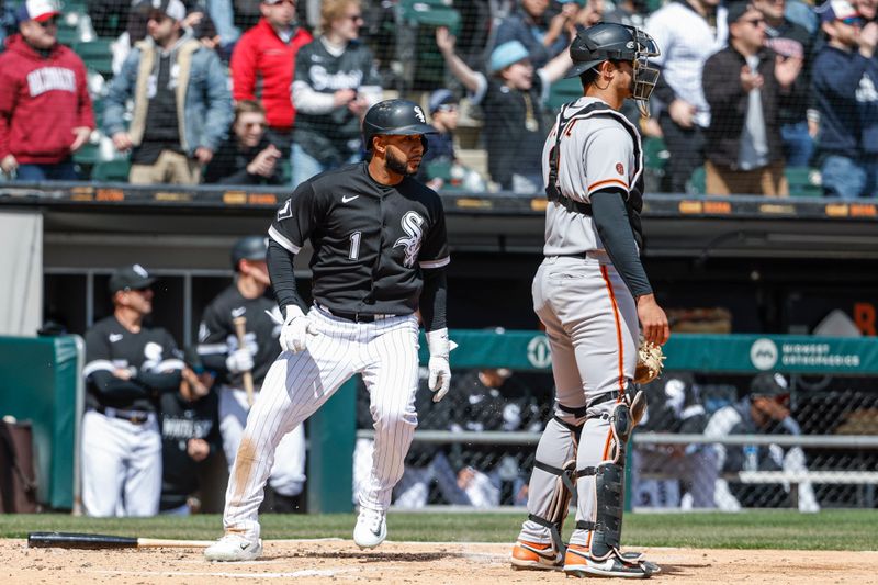 Apr 6, 2023; Chicago, Illinois, USA; Chicago White Sox second baseman Elvis Andrus (1) scores against the San Francisco Giants during the second inning at Guaranteed Rate Field. Mandatory Credit: Kamil Krzaczynski-USA TODAY Sports