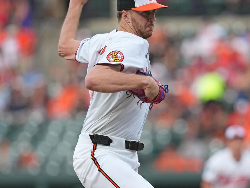 Aug 13, 2024; Baltimore, Maryland, USA; Baltimore Orioles pitcher Trevor Rogers (28) pitches in the first inning against the Washington Nationals at Oriole Park at Camden Yards. Mandatory Credit: Mitch Stringer-USA TODAY Sports