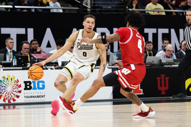 Mar 16, 2024; Minneapolis, MN, USA; Purdue Boilermakers forward Mason Gillis (0) works around Wisconsin Badgers guard Kamari McGee (4) during the first half at Target Center. Mandatory Credit: Matt Krohn-USA TODAY Sports