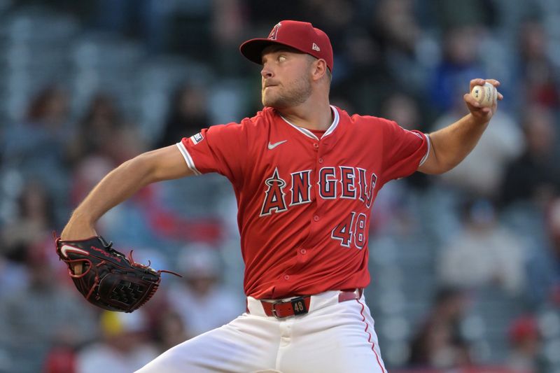 May 9, 2024; Anaheim, California, USA;  Los Angeles Angels pitcher Reid Detmers (48) delivers to the plate in the third inning against the Kansas City Royals at Angel Stadium. Mandatory Credit: Jayne Kamin-Oncea-USA TODAY Sports