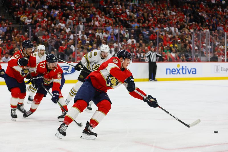 May 6, 2024; Sunrise, Florida, USA; Florida Panthers defenseman Gustav Forsling (42) moves the puck against the Boston Bruins during the first period in game one of the second round of the 2024 Stanley Cup Playoffs at Amerant Bank Arena. Mandatory Credit: Sam Navarro-USA TODAY Sports