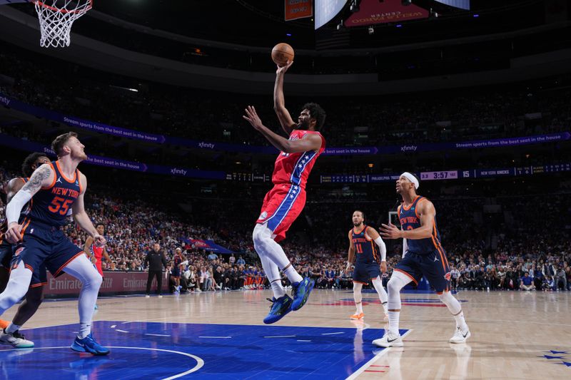 PHILADELPHIA, PA - APRIL 28: Joel Embiid #21 of the Philadelphia 76ers shoots the ball during the game against the New York Knicks during Round 1 Game 4 of the 2024 NBA Playoffs on April 28, 2024 at the Wells Fargo Center in Philadelphia, Pennsylvania NOTE TO USER: User expressly acknowledges and agrees that, by downloading and/or using this Photograph, user is consenting to the terms and conditions of the Getty Images License Agreement. Mandatory Copyright Notice: Copyright 2024 NBAE (Photo by Jesse D. Garrabrant/NBAE via Getty Images)