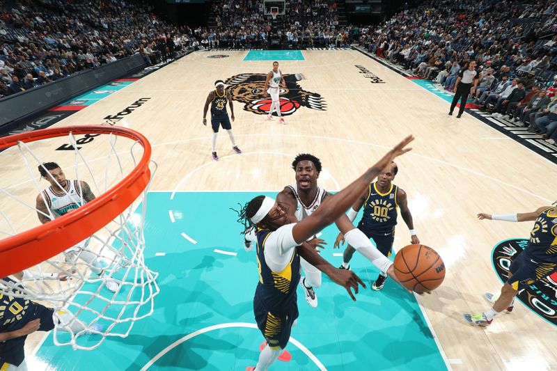 MEMPHIS, TN - DECEMBER 1: Jaren Jackson Jr. #13 of the Memphis Grizzlies drives to the basket during the game against the Indiana Pacers on December 1, 2024 at FedExForum in Memphis, Tennessee. NOTE TO USER: User expressly acknowledges and agrees that, by downloading and or using this photograph, User is consenting to the terms and conditions of the Getty Images License Agreement. Mandatory Copyright Notice: Copyright 2024 NBAE (Photo by Joe Murphy/NBAE via Getty Images)