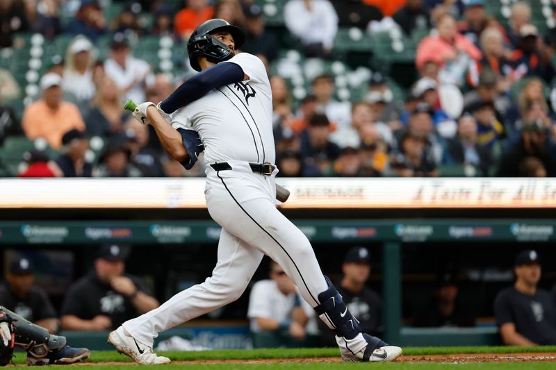 Sep 24, 2024; Detroit, Michigan, USA;  Detroit Tigers left fielder Riley Greene (31) hits a single in the fourth inning against the Tampa Bay Rays at Comerica Park. Mandatory Credit: Rick Osentoski-Imagn Images