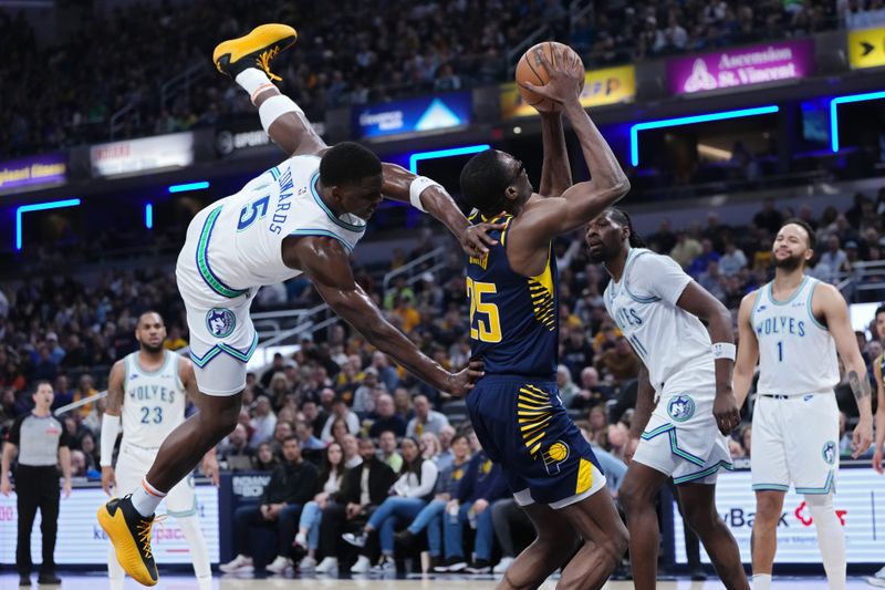 INDIANAPOLIS, INDIANA - MARCH 07: Jalen Smith #25 of the Indiana Pacers attempts a shot while being fouled by Anthony Edwards #5 of the Minnesota Timberwolves in the first quarter at Gainbridge Fieldhouse on March 07, 2024 in Indianapolis, Indiana. NOTE TO USER: User expressly acknowledges and agrees that, by downloading and or using this photograph, User is consenting to the terms and conditions of the Getty Images License Agreement. (Photo by Dylan Buell/Getty Images)