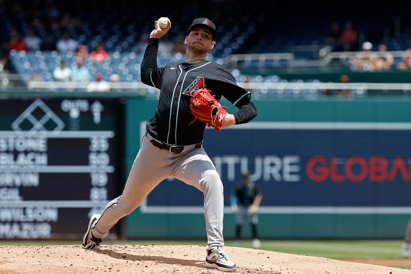 Jun 20, 2024; Washington, District of Columbia, USA; Arizona Diamondbacks starting pitcher Ryne Nelson (19) pitches against the Washington Nationals during the first inning at Nationals Park. Mandatory Credit: Geoff Burke-USA TODAY Sports