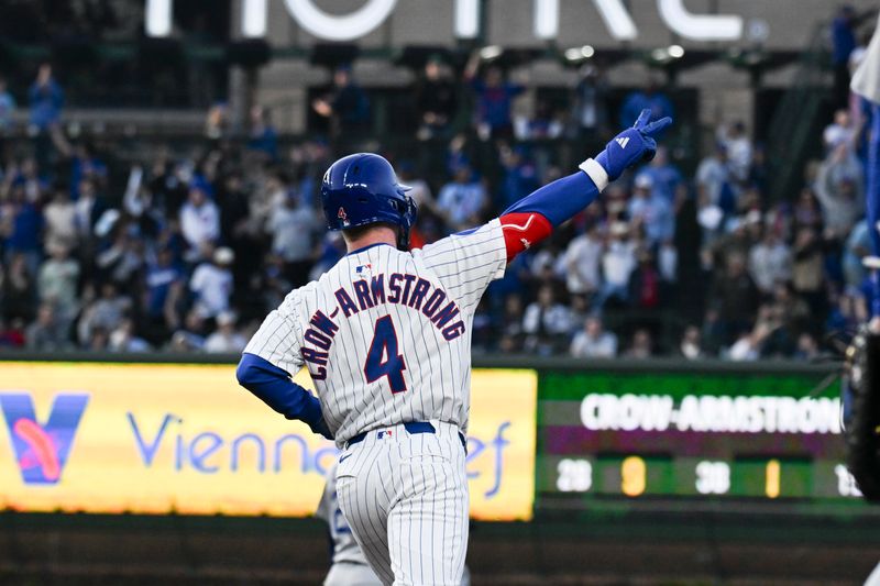 Apr 23, 2025; Chicago, Illinois, USA;  Chicago Cubs outfielder Pete Crow-Armstrong (4) points after hitting a three-run home run during the fourth inning against the Los Angeles Dodgers at Wrigley Field. Mandatory Credit: Matt Marton-Imagn Images