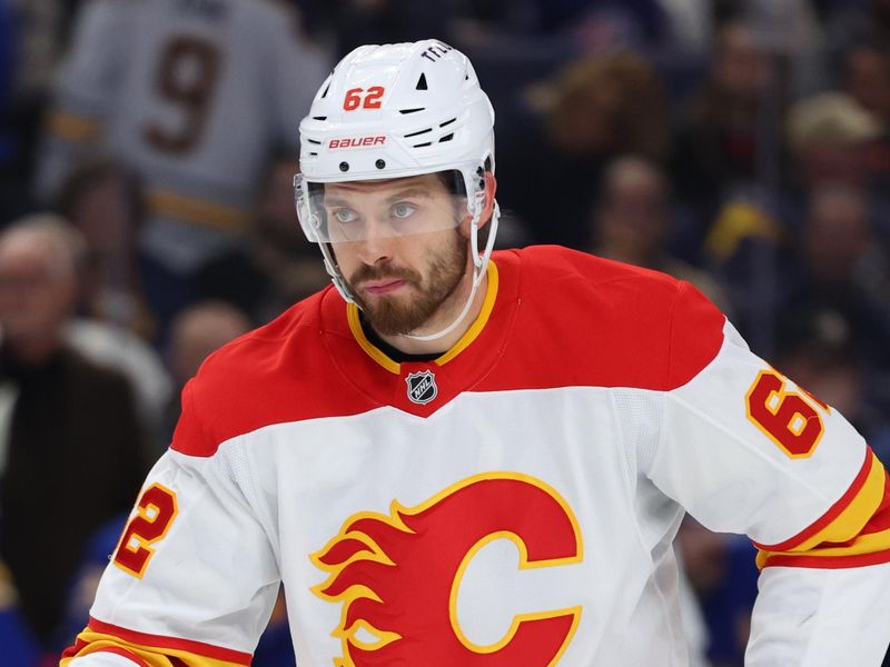 Nov 9, 2024; Buffalo, New York, USA;  Calgary Flames defenseman Daniil Miromanov (62) waits for the face-off during the first period against the Buffalo Sabres at KeyBank Center. Mandatory Credit: Timothy T. Ludwig-Imagn Images