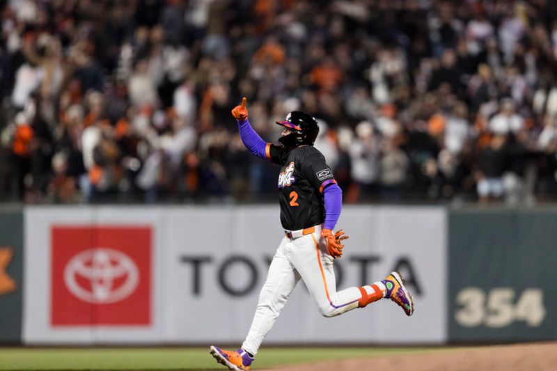 May 13, 2025; San Francisco, California, USA; San Francisco Giants shortstop Willy Adames (2) gestures as he runs the bases after hitting a two-run home run against the Arizona Diamondbacks during the fifth inning at Oracle Park. Mandatory Credit: John Hefti-Imagn Images