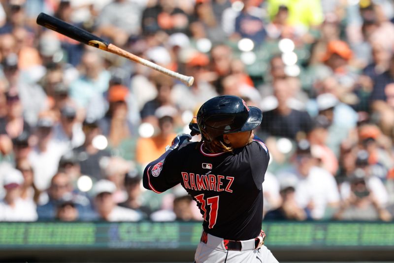 Sep 18, 2025; Detroit, Michigan, USA;  Cleveland Guardians third base Jose Ramirez (11) looses his bat in the first inning against the Detroit Tigers at Comerica Park. Mandatory Credit: Rick Osentoski-Imagn Images