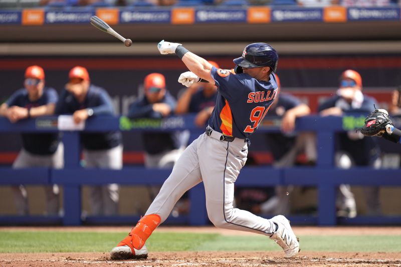 Mar 1, 2026; Port St. Lucie, Florida, USA;  Houston Astros center fielder Joseph Sullivan (90) loses his bat into his own dugout in the second inning against the New York Mets at Clover Park. Mandatory Credit: Jim Rassol-Imagn Images