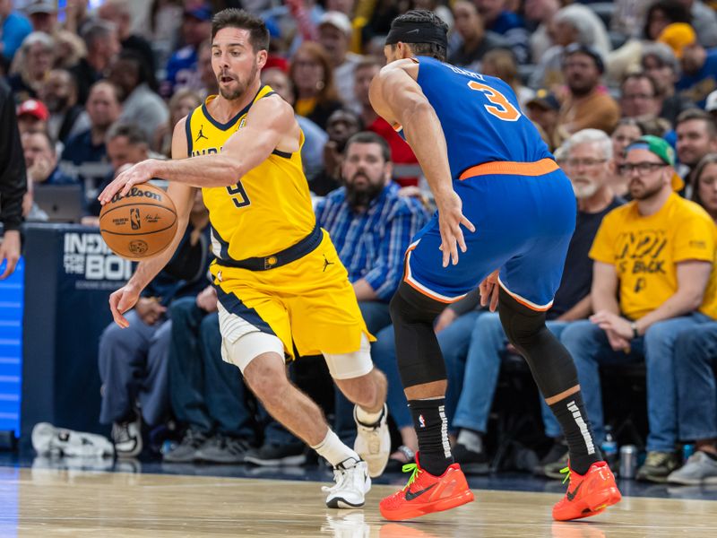 INDIANAPOLIS, INDIANA - NOVEMBER 10: T.J. McConnell #9 of the Indiana Pacers brings the ball up court during the game against Josh Hart #3 of the New York Knicks at Gainbridge Fieldhouse on November 10, 2024 in Indianapolis, Indiana. NOTE TO USER: User expressly acknowledges and agrees that, by downloading and or using this photograph, User is consenting to the terms and conditions of the Getty Images License Agreement. (Photo by Michael Hickey/Getty Images)